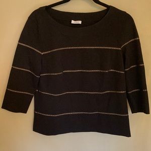 AKRIS  punto black top with nude sheer silk detailing.